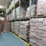 High-quality disposable gloves storage in warehouse for industrial use.