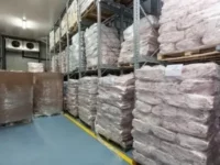 High-quality disposable gloves storage in warehouse for industrial use.