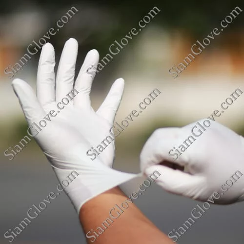 High-quality white disposable medical gloves for safety and hygiene in healthcare and industrial settings.